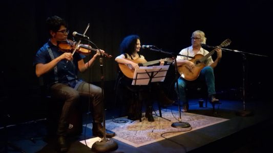 Photo by Andrew McPherson: Alex, Rosy and Richard on the stage at Artword Artbar, Hamilton